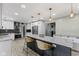 Modern kitchen featuring granite countertops, stainless steel appliances, and pendant lighting at 7630 Blain Way, Indianapolis, IN 46254
