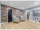 Comfortable living room area on the second floor with beautiful wood floors at 7630 Blain Way, Indianapolis, IN 46254