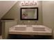 Bathroom featuring a double sink vanity with marble countertop and modern fixtures at 802 Fern Dr, Shelbyville, IN 46176