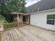 Wooden deck with pergola and access to the home and yard at 802 Fern Dr, Shelbyville, IN 46176