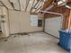 Spacious garage with exposed beams and plenty of potential at 802 Fern Dr, Shelbyville, IN 46176