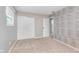 Bedroom featuring neutral walls, plush carpeting, and a closet for ample storage at 8205 Picadilly Ln, Indianapolis, IN 46256