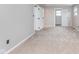 This bedroom features plush carpet, a window for natural light, and neutral paint at 8205 Picadilly Ln, Indianapolis, IN 46256