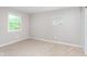 Bedroom with soft carpeting, two bright windows, and a closet for storage at 8205 Picadilly Ln, Indianapolis, IN 46256