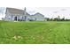 Expansive backyard perfect for outdoor activities and entertaining, featuring a patio and hot tub at 925 Bent Branch Cir, Greenwood, IN 46143