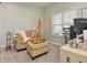 Cozy home office featuring a comfortable couch, natural light, and modern office equipment for productivity at 925 Bent Branch Cir, Greenwood, IN 46143
