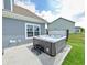 Outdoor hot tub perfect for relaxation and entertainment featuring a large backyard and blue siding at 925 Bent Branch Cir, Greenwood, IN 46143