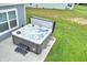 Relax in this backyard hot tub with easy access steps, perfect for unwinding after a long day at 925 Bent Branch Cir, Greenwood, IN 46143