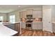 Well-equipped kitchen with stainless steel appliances and gray cabinets at 925 Bent Branch Cir, Greenwood, IN 46143