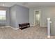 Spacious loft area with a window for ample light, ready to be used as a sitting or game area at 925 Bent Branch Cir, Greenwood, IN 46143