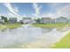 Scenic view of the neighborhood pond and fountain from the property, perfect for nature lovers at 925 Bent Branch Cir, Greenwood, IN 46143