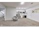 A finished basement with built-in shelves, a desk area, and comfortable seating at 9698 Coyote Ct, Noblesville, IN 46060