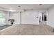 Finished basement area featuring plush carpeting, an exterior door, and access to other living spaces at 9698 Coyote Ct, Noblesville, IN 46060