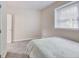 Bright bedroom with plush carpeting, window views, and a cozy ambiance at 9698 Coyote Ct, Noblesville, IN 46060