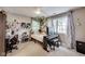 Bright bedroom with a double window, string lights and decorative ivy on the walls at 9698 Coyote Ct, Noblesville, IN 46060