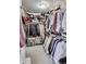 Walk-in closet with clothing racks and shelves at 9698 Coyote Ct, Noblesville, IN 46060