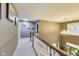 View of upstairs hallway with a chandelier and light from the window at 9698 Coyote Ct, Noblesville, IN 46060