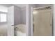 Bathroom showcasing a shower and tub with a door to the bedroom at 1024 Rotherham Ln, Beech Grove, IN 46107
