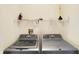Laundry room with modern washer and dryer units at 1024 Rotherham Ln, Beech Grove, IN 46107
