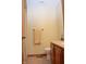 Clean bathroom with wood vanity, granite counters and modern fixtures at 1065 Lakewood South Dr, Brownsburg, IN 46112