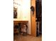 This organized closet includes a built-in vanity, mirror, and shelving for shoe storage at 1065 Lakewood South Dr, Brownsburg, IN 46112