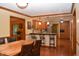 Eat-in kitchen with granite counters, stainless appliances, and a breakfast bar at 1065 Lakewood South Dr, Brownsburg, IN 46112