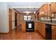 Well-equipped kitchen boasts updated appliances, ample counter space, and wood cabinets at 1065 Lakewood South Dr, Brownsburg, IN 46112