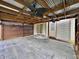 Covered back patio with ceiling fans and a stamped concrete floor at 10725 Tedder Lake Dr, Indianapolis, IN 46239