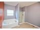 Spacious bathroom features a soaking tub and separate glass door shower at 10725 Tedder Lake Dr, Indianapolis, IN 46239