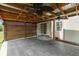 Covered patio with ceiling fans and patterned wood screen, providing a shaded area for outdoor enjoyment at 10725 Tedder Lake Dr, Indianapolis, IN 46239