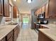 Bright kitchen with stainless appliances and a view into the dining area at 10725 Tedder Lake Dr, Indianapolis, IN 46239