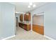 Kitchen offers ample cabinets, stainless appliances, and easy access to living room at 10725 Tedder Lake Dr, Indianapolis, IN 46239