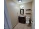 Bathroom with a dark wooden vanity, and a granite counter and toilet at 11070 Long Lake Ln, Fishers, IN 46037