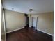 Bedroom featuring hardwood floors and attached closet at 11070 Long Lake Ln, Fishers, IN 46037