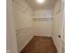 Walk-in closet with carpet and wire shelving at 11070 Long Lake Ln, Fishers, IN 46037
