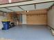 The organized garage features a sealed floor, storage shelves, and ample space for vehicles and equipment at 11070 Long Lake Ln, Fishers, IN 46037