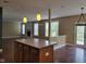 Open living room featuring a fireplace and hardwood floors at 11070 Long Lake Ln, Fishers, IN 46037