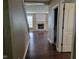 Inviting living room features a stone fireplace, hardwood floors, and an open concept design at 11070 Long Lake Ln, Fishers, IN 46037