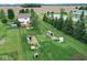 Aerial view of the property showing a barn and fenced area at 11198 N 650 W, Fountaintown, IN 46130