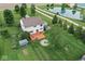 Aerial view of the home showcasing a deck and a spacious yard at 11198 N 650 W, Fountaintown, IN 46130
