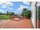 Spacious wooden back deck with outdoor grill and dining set, perfect for entertaining at 11198 N 650 W, Fountaintown, IN 46130