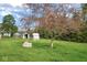 Lawn area with sheds and pens at 11198 N 650 W, Fountaintown, IN 46130