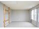 Bedroom featuring soft gray walls, carpet, and lots of natural light at 11198 N 650 W, Fountaintown, IN 46130