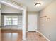 An entryway with ceramic tile flooring and a glimpse into a sunlit living room at 11198 N 650 W, Fountaintown, IN 46130