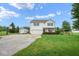 Beautiful front yard with a well-maintained lawn, shed, basketball hoop, and inviting landscaping at 11198 N 650 W, Fountaintown, IN 46130