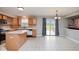 Bright kitchen features wood cabinets, stainless steel appliances, and sliding glass doors to the deck at 11198 N 650 W, Fountaintown, IN 46130