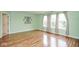 Bright living room with hardwood floors and natural light at 11198 N 650 W, Fountaintown, IN 46130