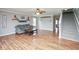 Spacious living room with hardwood floors and a staircase for easy access to the second floor at 11198 N 650 W, Fountaintown, IN 46130