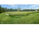Large grassy field with storage shed in background at 11198 N 650 W, Fountaintown, IN 46130