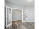Neutral bedroom featuring an open doorway and light-colored walls at 1221 Hamilton Dr, Greenwood, IN 46143